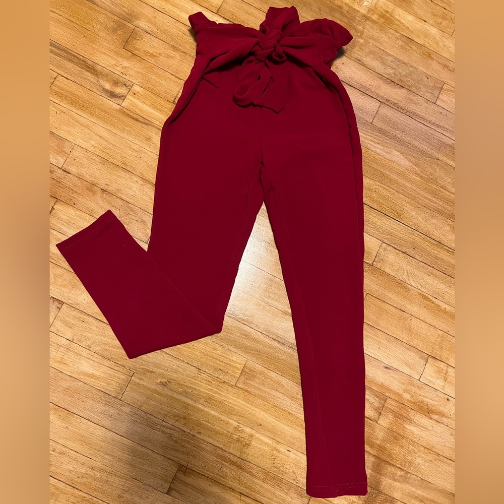Beautiful red paper bag pants. Great for the office or a night on the town.